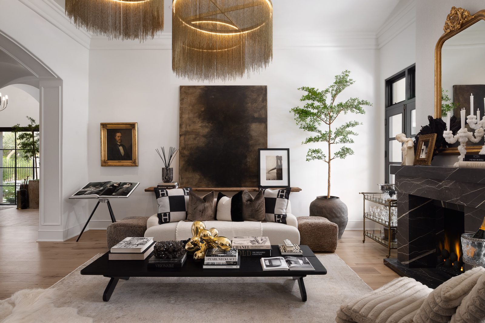 Estancia great room with layered lighting