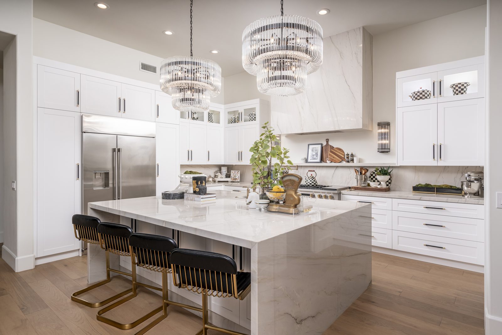 North Scottsdale remodel — white marble kitchen with crystal chandeliers