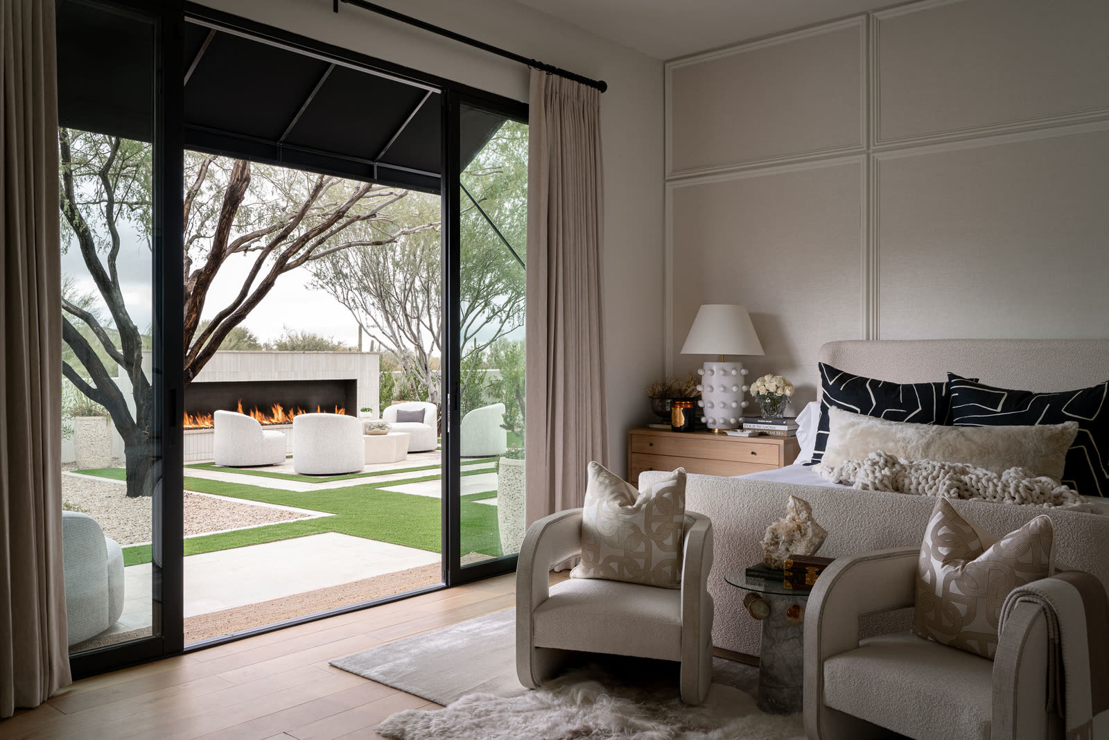 The B2B Residence — paneled hall with vintage trunks